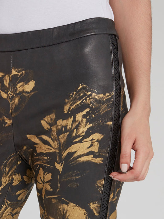 Кожаные брюки с золотым цветочным принтом