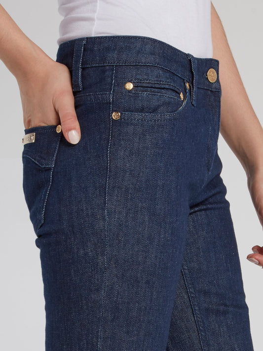 Выбеленные джинсы с легким клешем