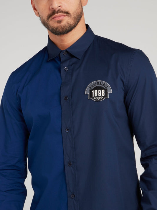 Темно-синяя рубашка с логотипом