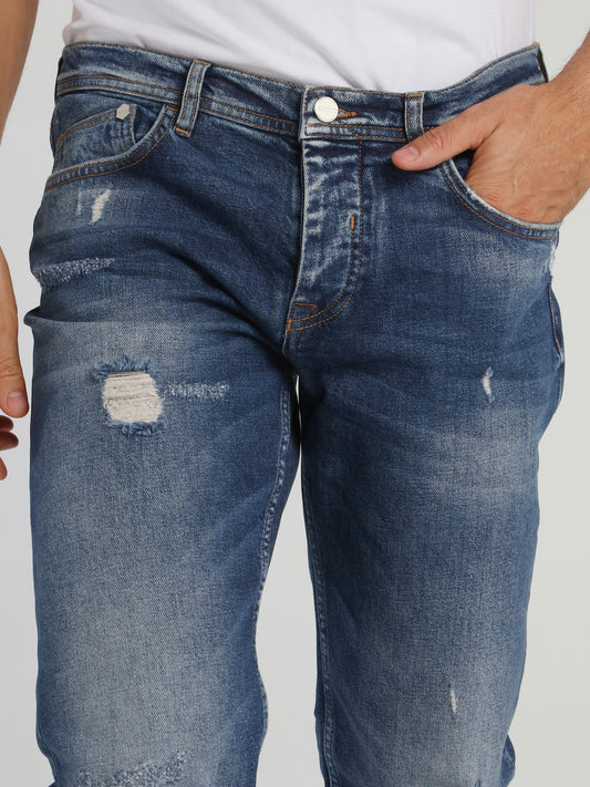 Distressed Tapered Cut Jeans
