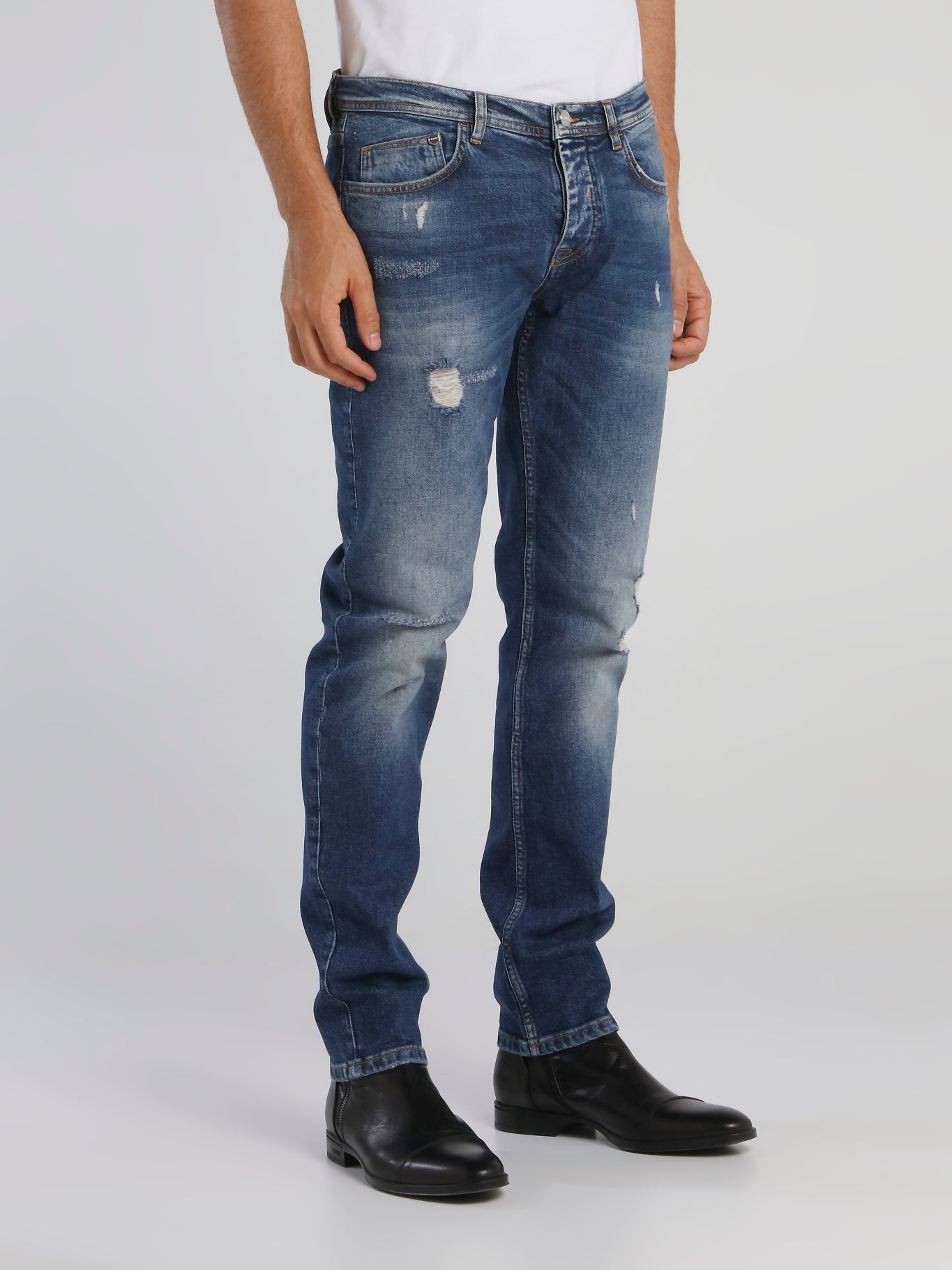 Distressed Tapered Cut Jeans