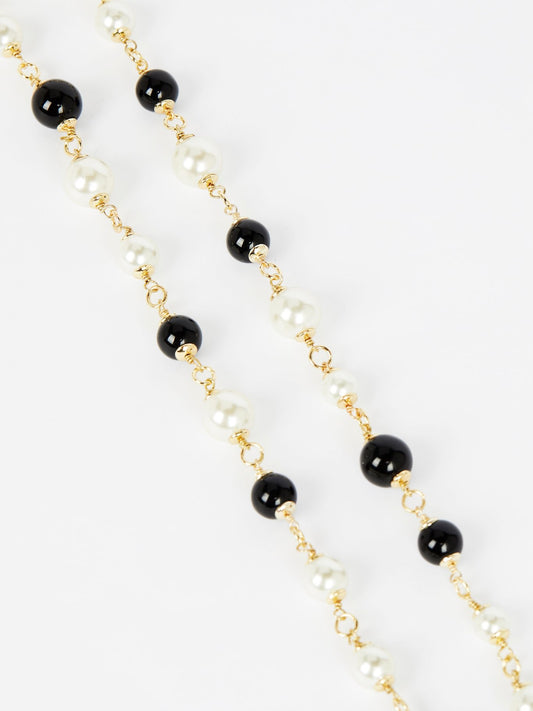 Ожерелье с белыми и черными жемчужинами